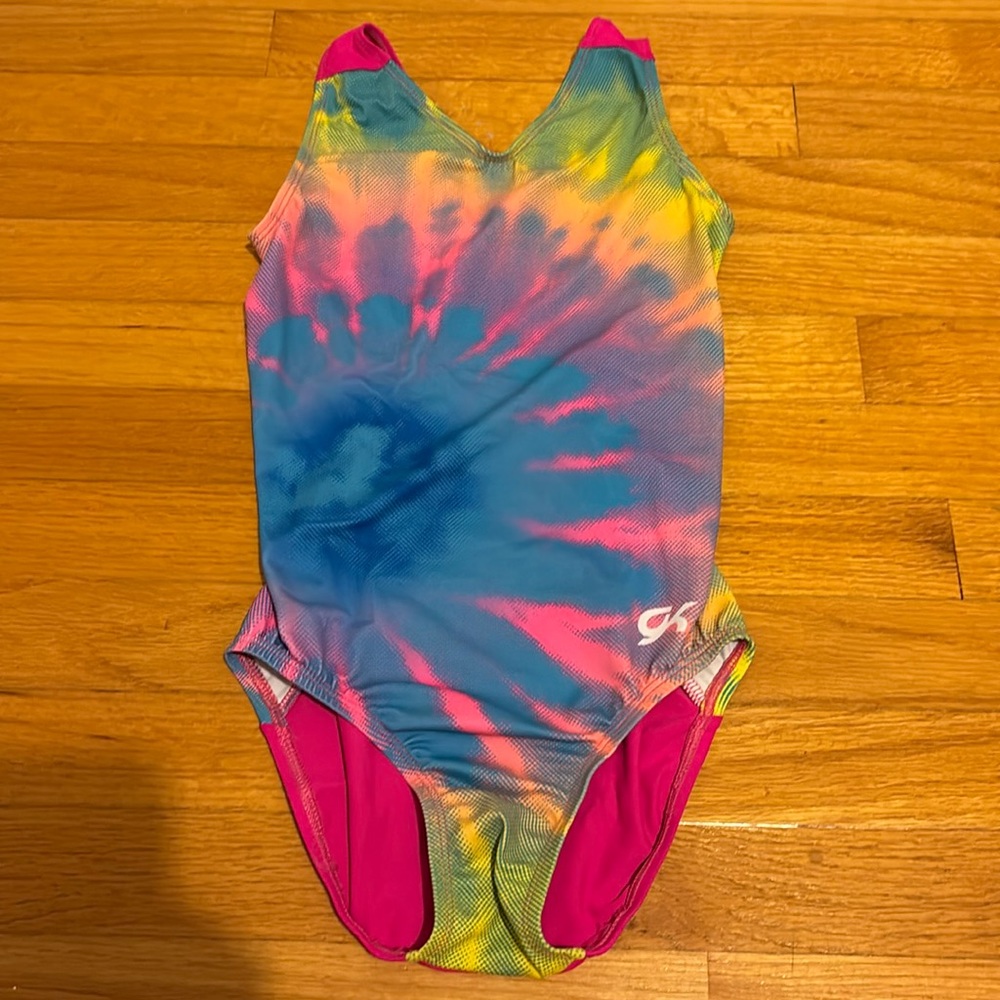 Pink tie-dye gymnastics leotard